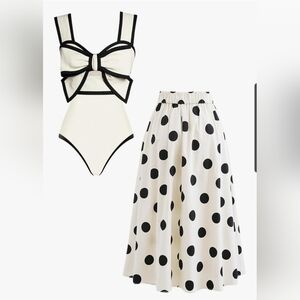 Elegant Black and White  One Piece Swimsuit With A Polka Dot Skirt Size Small